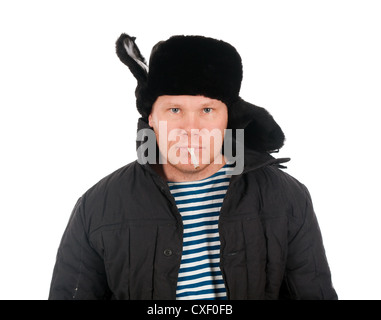 Uomo russo in inverno cappello di pelliccia ,rosso-collo. Foto Stock