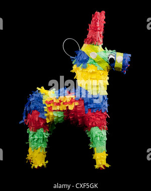 Vivacemente colorato burro piñata su sfondo nero Foto Stock