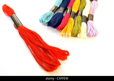 colorful woolen yarn in the colors yellow, red, blue and green