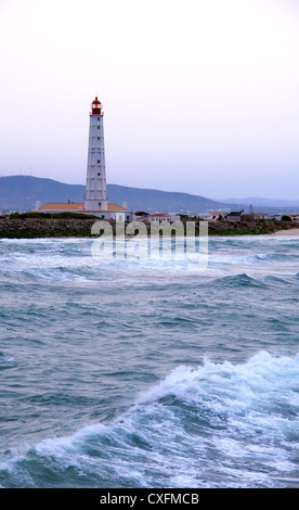 Faro in 'Farol' isola di sunrise, Ria Formosa, conservazione naturale regione di Algarve, PORTOGALLO Foto Stock