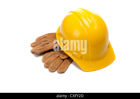 Casco giallo con guanti da lavoro Foto Stock