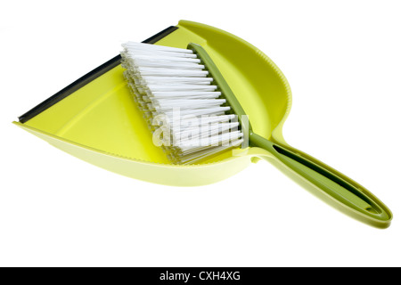 In plastica verde Paletta e spazzola Foto Stock