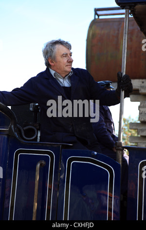 Driver del motore sul Strathspey Steam Railway in Aviemore nelle Highlands della Scozia Foto Stock