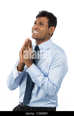 Asian Business man meditando in camicia e cravatta. Foto Stock