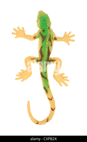 Vista dall'alto di un giocattolo gecko su uno sfondo bianco. Foto Stock