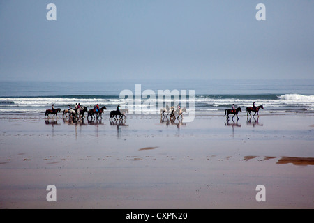 I piloti a cavallo sulla spiaggia di Saltburn Foto Stock