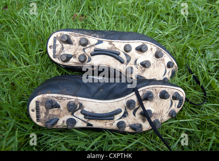 Una coppia di umbro scarpe da calcio Foto Stock