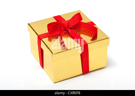 Golden confezione regalo con nastro rosso Foto Stock