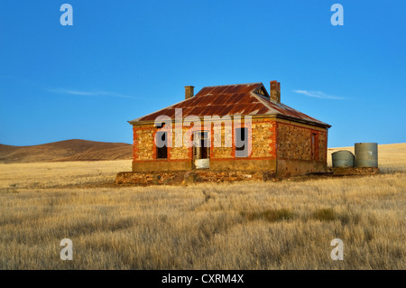 Iconico Cobb & Co Cottage nel afterglow. Foto Stock