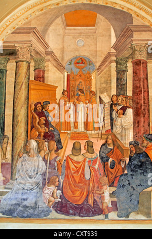 Serie di affreschi raffiguranti la vita di san Benedetto, affresco del Sodoma, scena 33, Benedetto fornendo assoluzione per scomunicato Foto Stock
