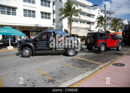 Auto viene trainato per parcheggio violazione South Beach di Miami Florida usa Foto Stock