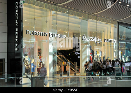Negozio adiacente fronti di Dorothy Perkins Miss Selfridge & Burton memorizza tutti i marchi del Gruppo Arcadia nel centro commerciale Foto Stock