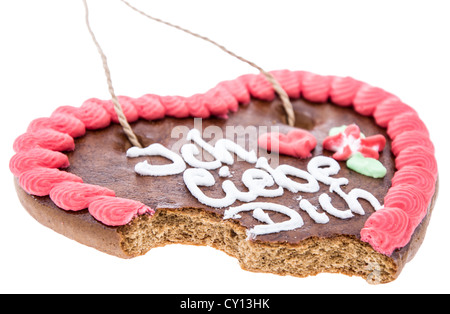 Morso off Gingerbread cuore isolato su sfondo bianco Foto Stock