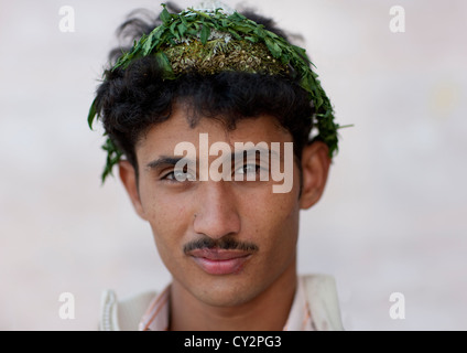 Uomo di fiori da Asir, Arabia Saudita Foto Stock