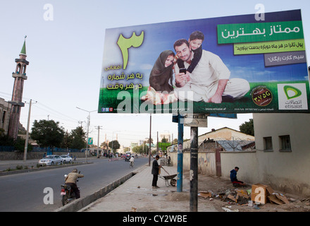 Affissioni con telefono cellulare pubblicità in Afghanistan Foto Stock