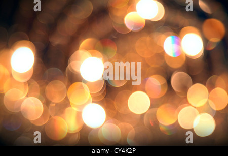 Abstract sfocati golden lights sfondo. Bokeh di fondo naturale patten Foto Stock