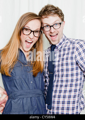 Studio Shot, Ritratto di giovane Coppia sorridente Foto Stock