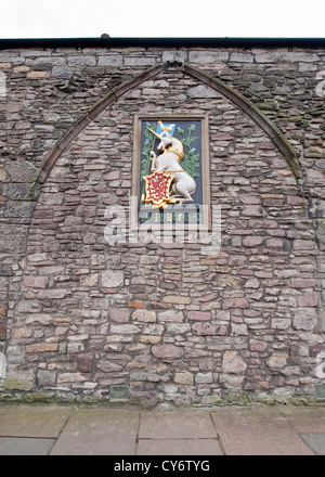 James V bianco unicorn emblema sulla parete esterna del Palazzo di Holyroodhouse Foto Stock