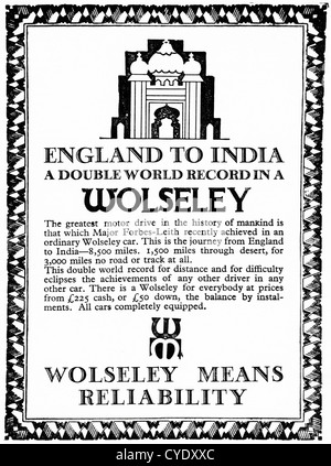 Originale di 1920s vintage annuncio stampa dalla rivista inglese pubblicità Wolseley vettura pilotata overland dall Inghilterra in India nel 1924 dai principali Forbes-Leith Foto Stock