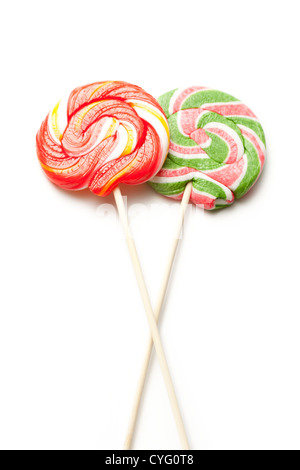 Luminose lollipop candy su sfondo bianco Foto Stock