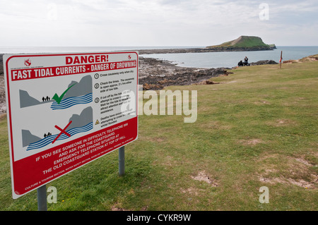 Il Galles, Penisola di Gower, Rhossili, Worm Testa, causeway pericolo segnale di avvertimento Foto Stock