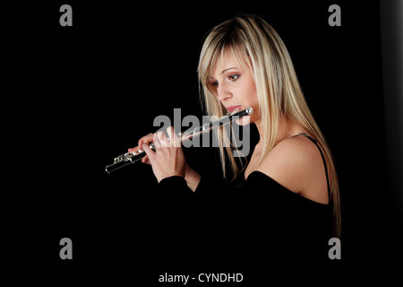 Ritratto di una donna la riproduzione di flauto traverso Foto Stock
