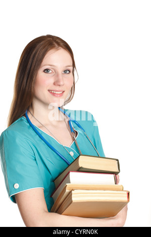 Il ritratto di tipo medico donna in divisa verde con i libri Foto Stock