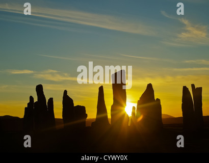 Tramonto a Standing Pietre di Callanish (Calanais) sull'isola di Lewis Ebridi Esterne, Scozia. Foto Stock