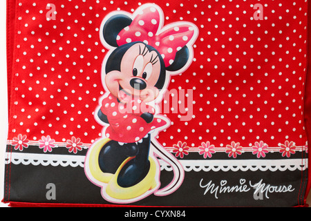 Dettaglio di Minnie Mouse sulla colorata di rosso polka dot shopping bag Foto Stock