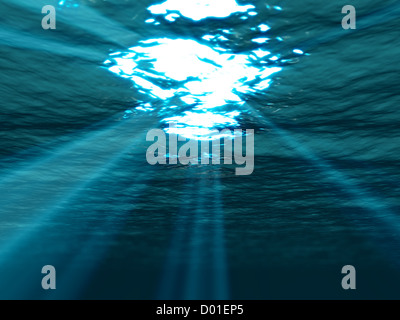 Underwater , superficie del mare con sole che splende attraverso Foto Stock