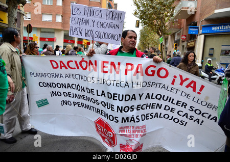 Manifestazioni & sciopero generale in L'Hospitalet de Llobregat (Barcelona). Richieste di pagamento in natura in ipoteche. Foto Stock