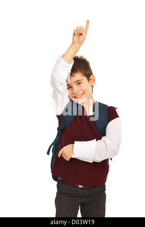 Scuola ragazzo con mano,egli conosce la risposta isolati su sfondo bianco Foto Stock