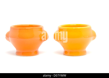 Due orange portauova bocce isolati su sfondo bianco Foto Stock