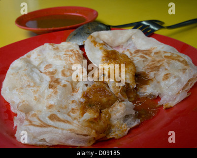 Roti Prata - cibo tradizionale Singapore Foto Stock