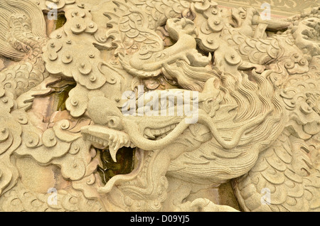 Dragon scolpito in pietra arenaria. Foto Stock