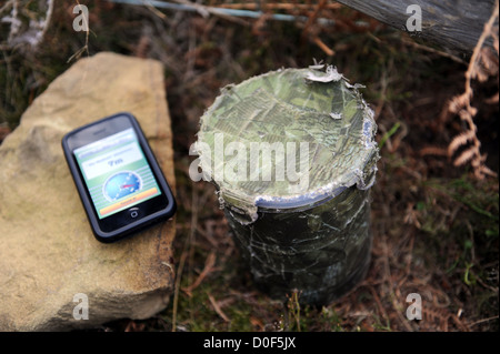 Geocache con iphone. Foto Stock