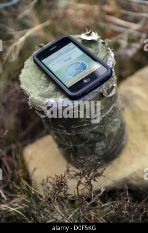 Geocache con iphone. Foto Stock