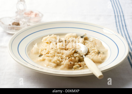 Pera e risotto al gorgonzola Foto Stock