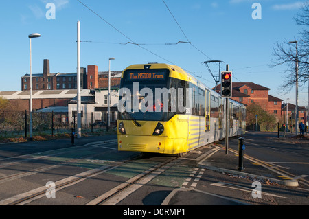 Tram Metrolink durante il test sulla East Manchester Linea, Merrill Street, Ancoats, Manchester, Inghilterra, Regno Unito Foto Stock