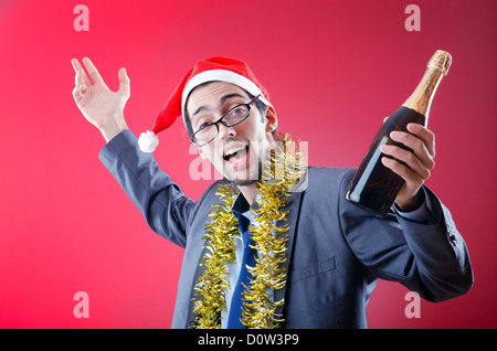 Drunken imprenditore ufficio dopo la festa di natale Foto Stock