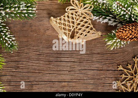 Bordo di Natale dal ramo e campane Foto Stock