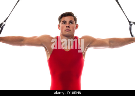 Giovani maschi adulti ginnasta. Studio shot su bianco. Foto Stock