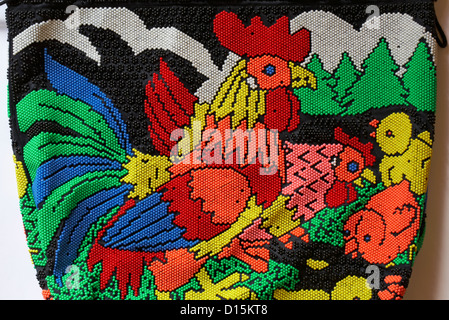 Dettaglio della sacca bordata con i polli e pulcini Foto Stock