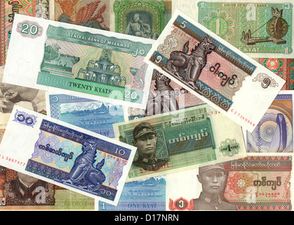 Sfondo del Myanmar: l unità monetaria è il Kyat bollette di denaro - vecchio e presente banconote Foto Stock