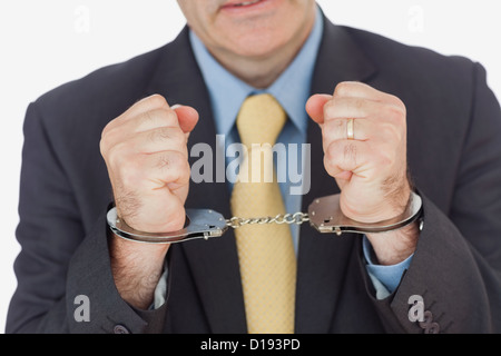 Close-up di imprenditore con ammanettati mani Foto Stock