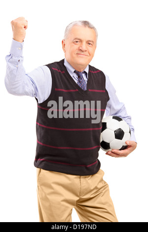 Una felice coppia ventola con gesti di calcio con la sua mano isolata contro uno sfondo bianco Foto Stock