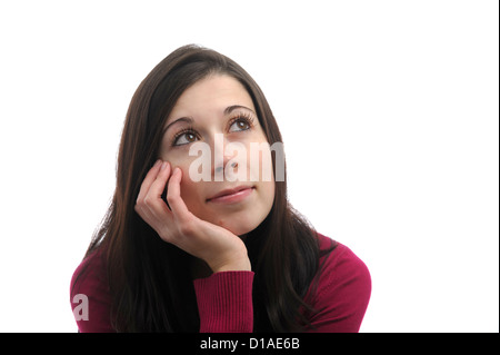 Ritratto di giovane donna con un look sognante sul suo volto, isolati su sfondo bianco Foto Stock