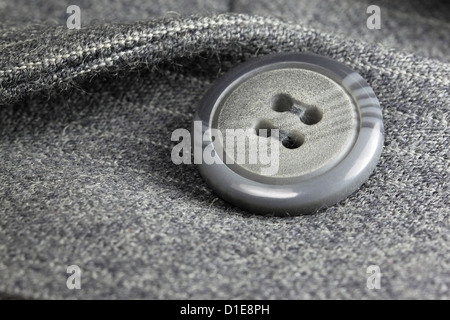 Pulsante su un business suit Foto Stock