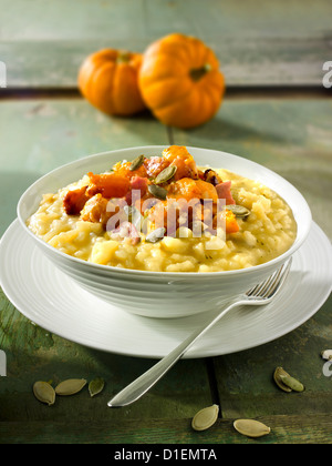 Arrosto di zucca e pancetta sul risotto safron Foto Stock