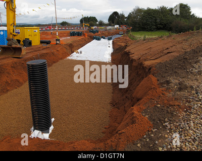 Grandi di acqua sotterranea camera di deposito cassa in plastica sistema sostenibile per il sistema di drenaggio saponata per la nuova autostrada schema UK Foto Stock